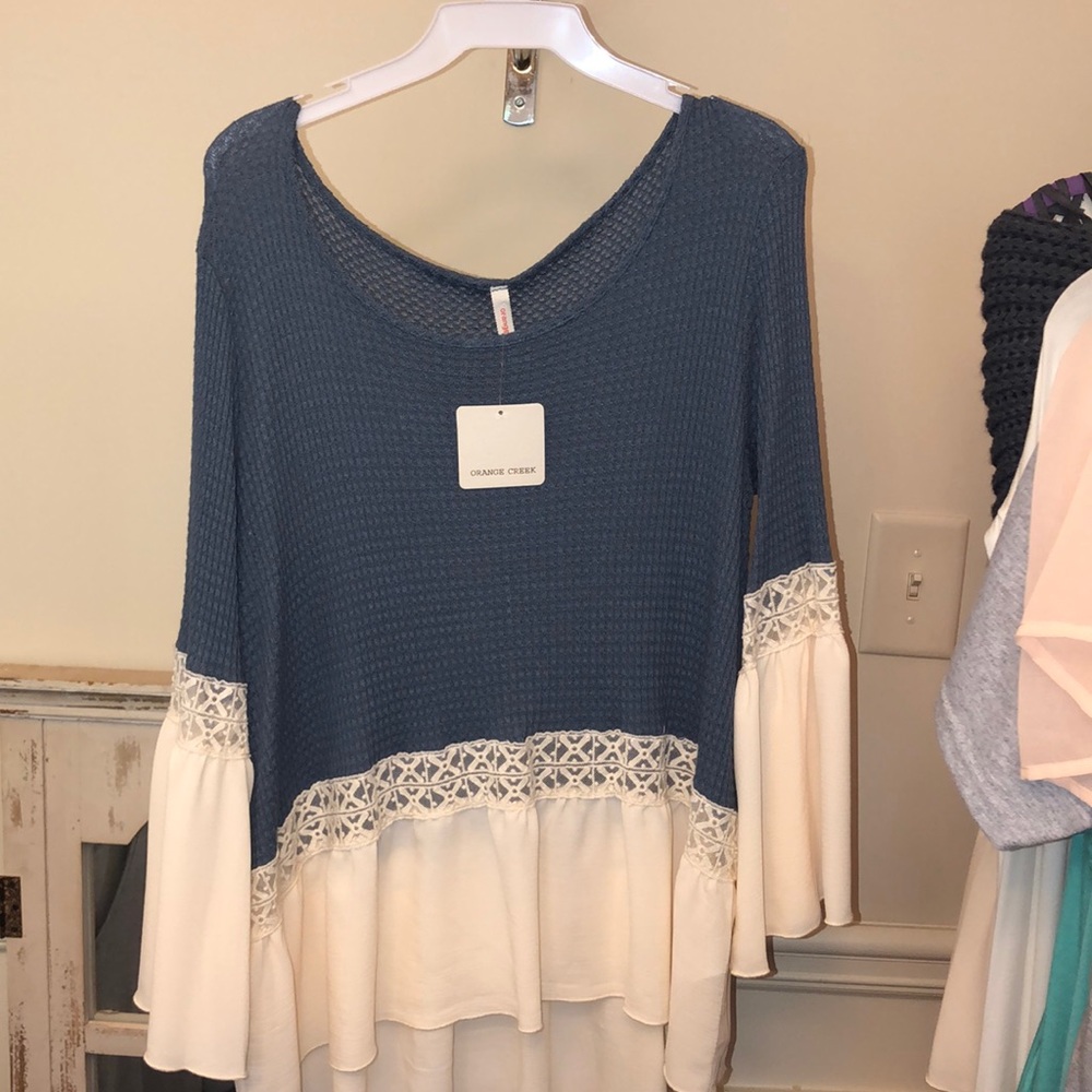 Orange Creek blue top with white